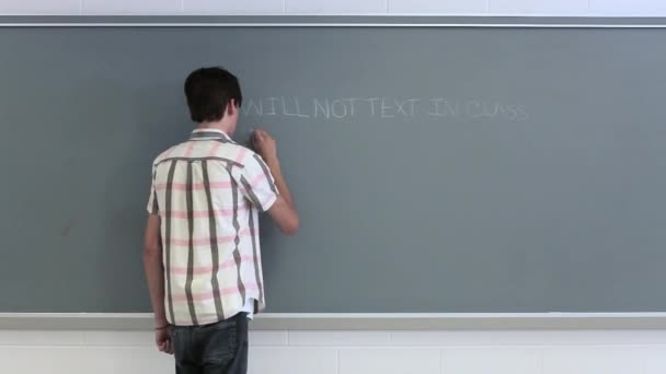 High School Student Writing Lines Blackboard — Stock Video