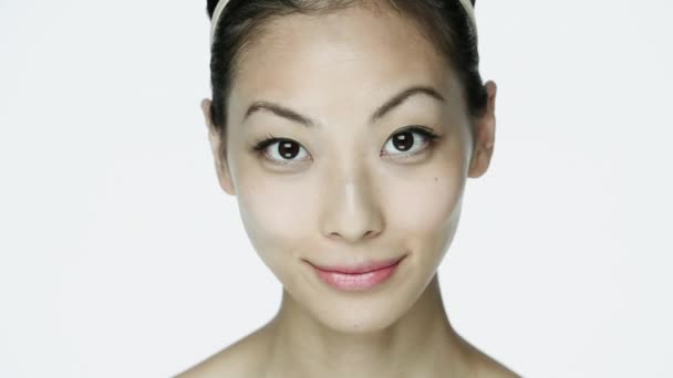 Young Woman Cleansing Face White Background — Stock Video