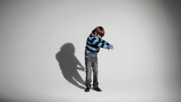 Boy Taking Sweater Walking Away — Stock Video