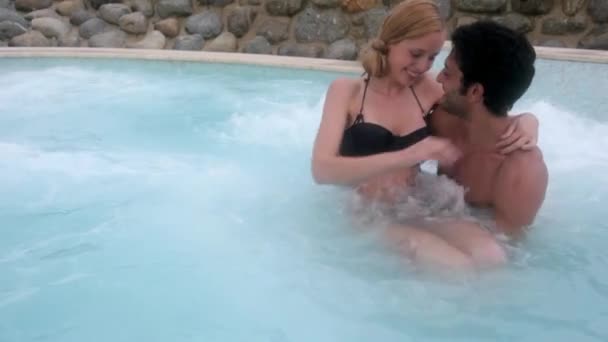 Young Couple Kissing Hot Tub — Stock Video