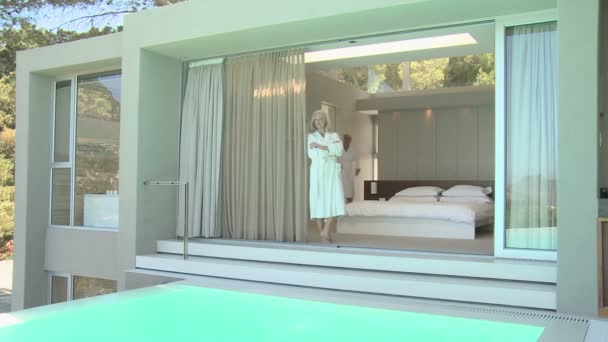 Mature Couple Bathrobes Luxury House Pool — Stock Video