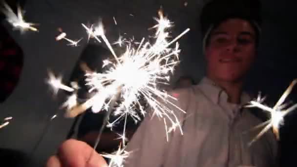 Young Man Holding Sparkler Party — Stock Video