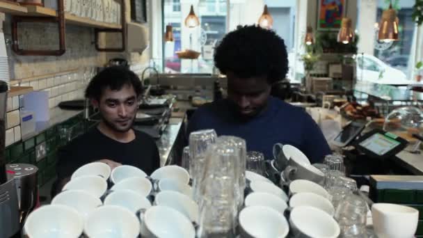 Men Arranging Cups Coffee Shop — Stock Video