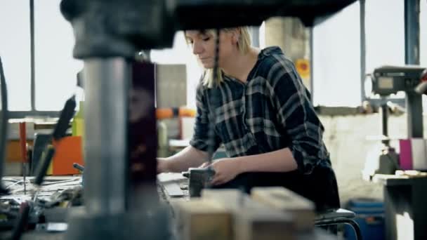 Woman Examining Knife Workshop — Stock Video