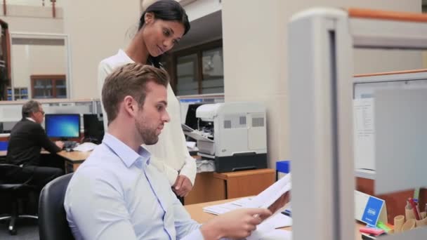 Colleagues Analyzing Documents Office — Stock Video