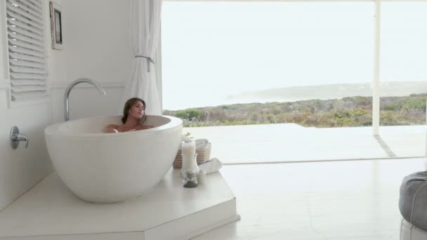 Young Woman Lying Bathtub Home — Stock Video
