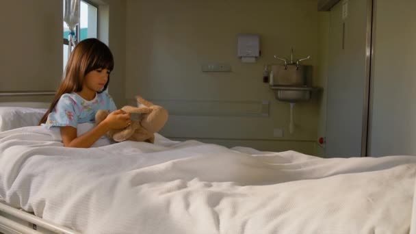 Girl Plush Rabbit Hospital Bed — Stock Video