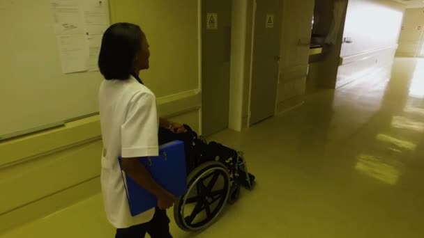 Nurse Wheelchair Hospital Corridor — Stock Video