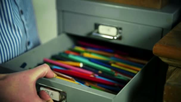 Close Female Artist Taking Pencils Out Drawer — Stock Video