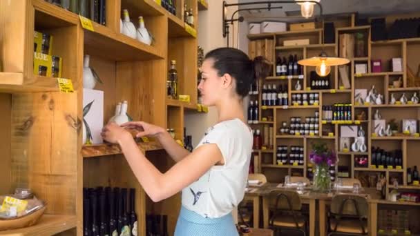 Woman Arranging Bottles Restaurant Shop — Stock Video