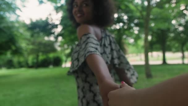 Female Friends Holding Hands Walking Park — Stock Video