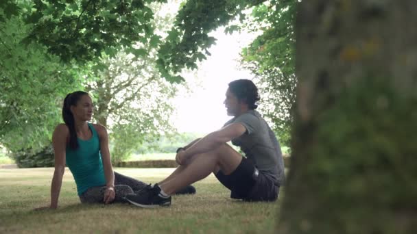 Man Woman Sitting Garden Talking — Stock Video