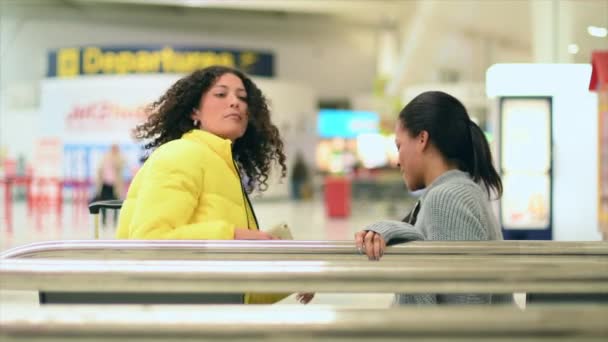 Women Sitting Talking Airport — Stock Video