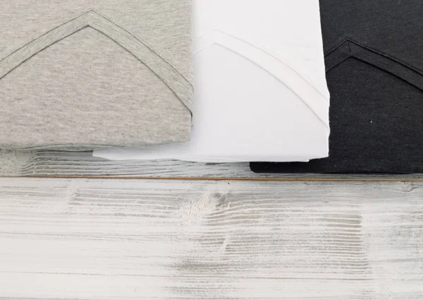 New Black White Grey Neck Shirt White Wooden Background — Stock Photo, Image