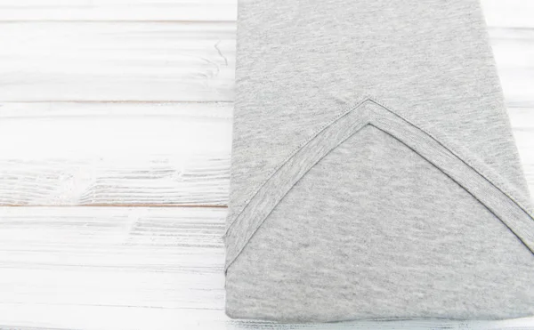 New Grey Neck Shirt White Wooden Background — Stock Photo, Image
