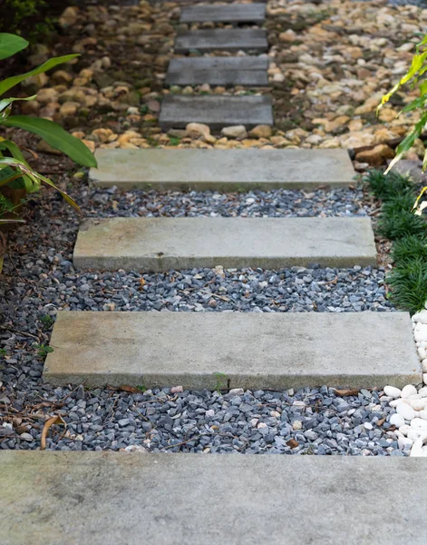 Landscape modern simple stone pathway in garden decoration with — Stock Photo, Image