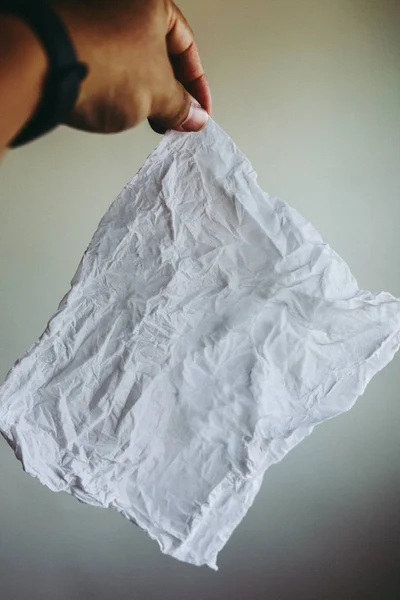 Close Hand Holding White Paper Tissue Background — Stock Photo, Image