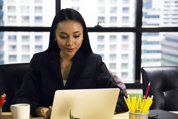 Beautiful Asia woman business working job in the office.