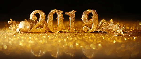 2019 in sparkling gold numbers celebrating the New Year