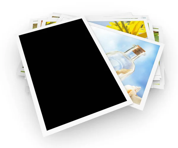 Stack of photos with blank photo on top — Stock Photo, Image