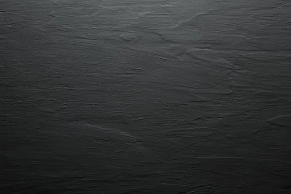 Dark black and grey slate like background or texture — Stock Photo, Image