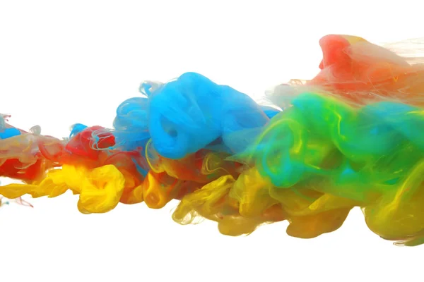 Wolken van heldere kleurrijke inkt mengen in water — Stockfoto