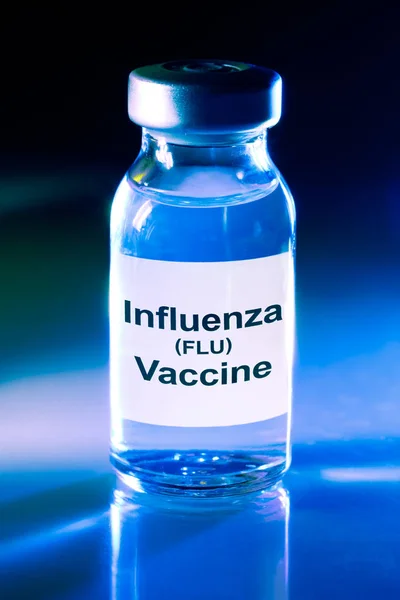 Malá drogovová lahvička s chřipkovou vakcínou — Stock fotografie