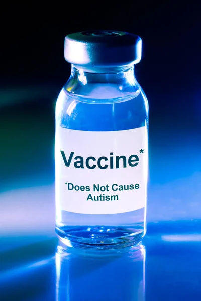 Vaccine vial - Does not cause autism — Stock Photo, Image