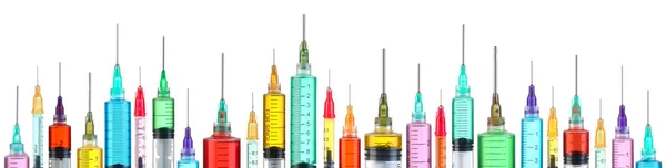 Row of bright colorful syringes — Stock Photo, Image