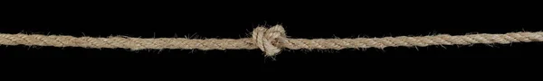 Dlouhé lano uvázané v uzlu — Stock fotografie