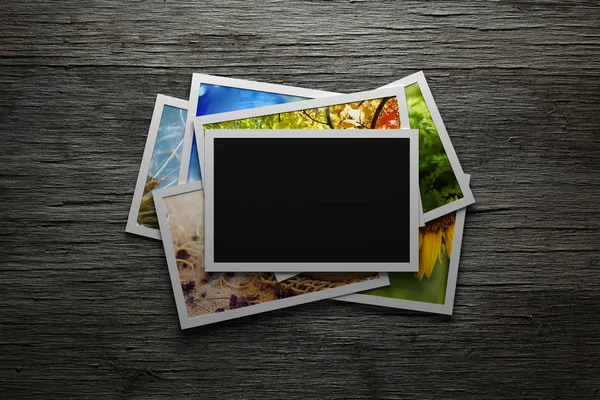 Mucchio di foto colorate con cornice vuota — Foto Stock