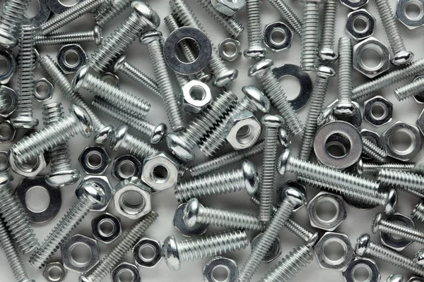 Nuts and bolts background — Stock Photo, Image