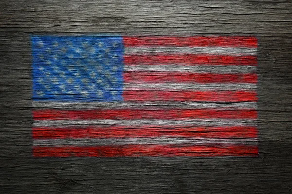 Spray de bandera estadounidense pintado en madera vieja en apuros — Foto de Stock