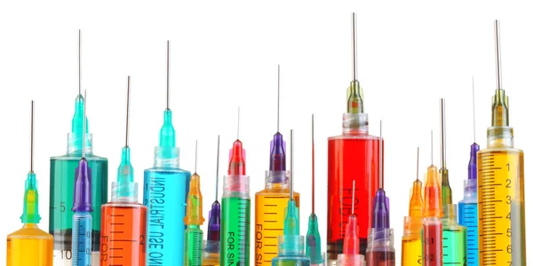 Collection of bright and colorful syringes — Stock Photo, Image