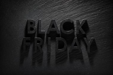 Siyah kayrak arka plan üzerinde Black Friday metin