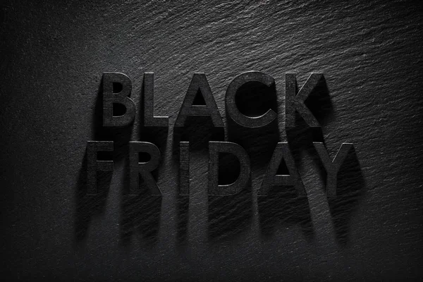 Siyah kayrak arka plan üzerinde Black Friday metin