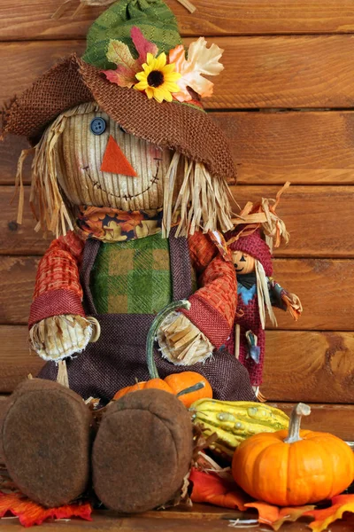Autumn Scarecrow on wooden background — Stock Photo, Image