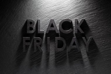 Siyah kayrak arka plan üzerinde Black Friday metin