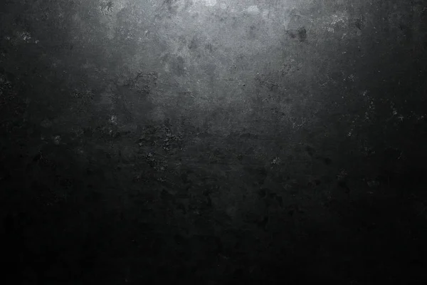 Áspero, fundo de pedra escura iluminado por holofotes fundo — Fotografia de Stock