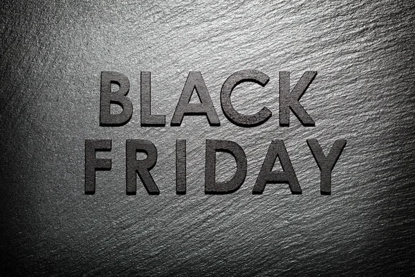 Black Friday text on black slate background — Stock Photo, Image