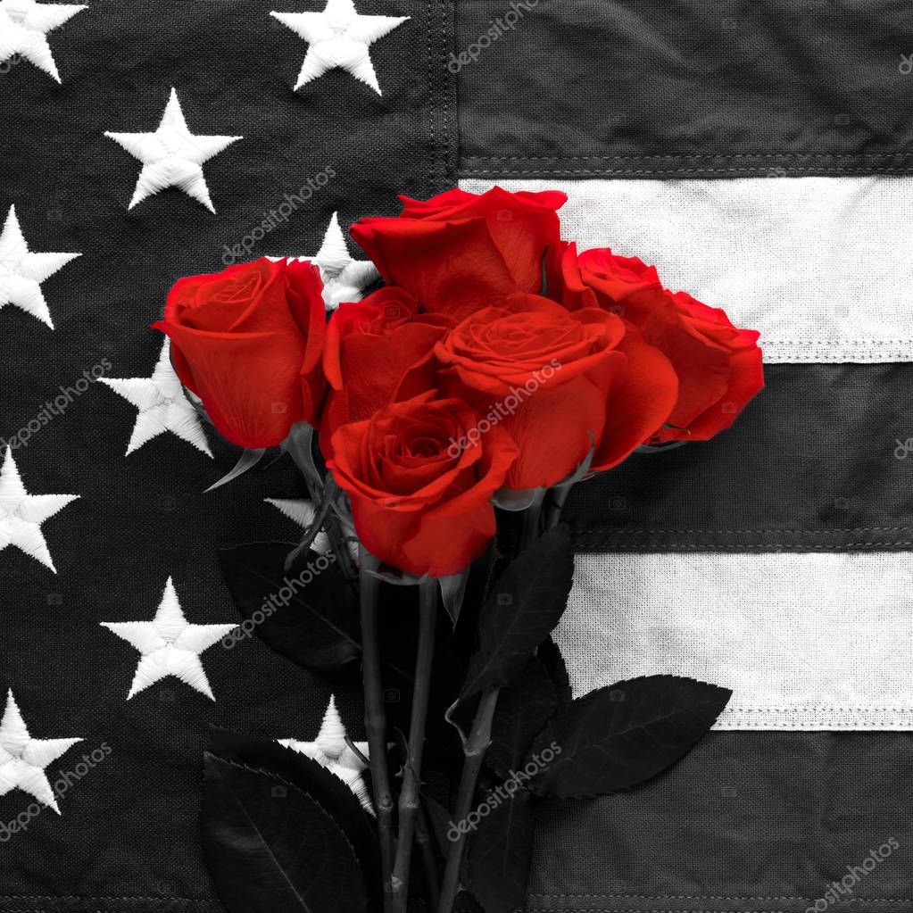 Black and white American flag with red roses