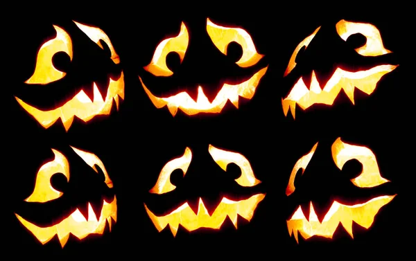 Collection of scary Halloween pumpkin Jack o lantern faces glowi — Stock Photo, Image