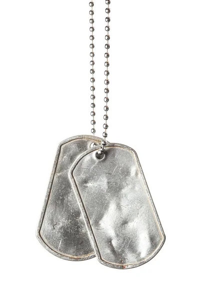 Old and worn blank military dog tags with chain isolated on whit — Stock Photo, Image