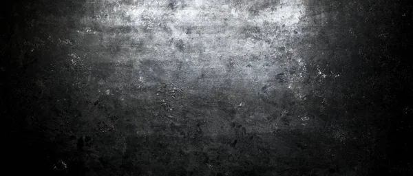 Muro di pietra scura e ruvida illuminato dall'alto dai riflettori. Grunge backg — Foto Stock