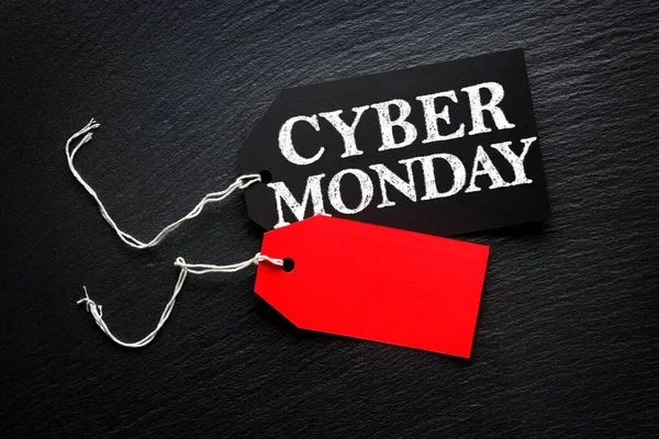 Cyber Monday Sale Tags auf dunklem Hintergrund — Stockfoto