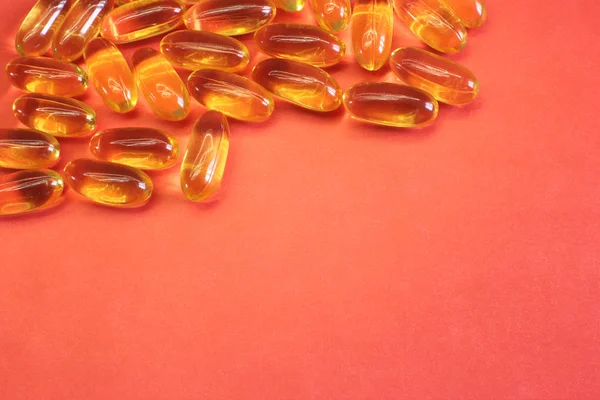 Vitaminler Sarı Balık Yağı Oval Kayıtları Için Parlak Bir Arka — Stok fotoğraf