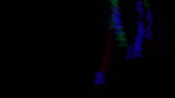 Bokeh Farklı Renklerde Yanıp Sönen Noel Ağaçları Şeklinde — Stok video