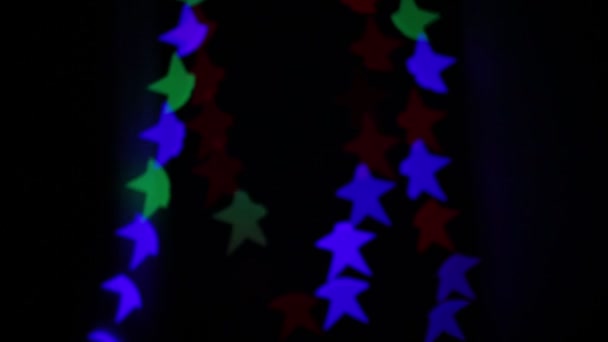 Bokeh Forma Estrella Parpadeando Diferentes Colores — Vídeo de stock