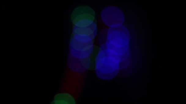 異なる色で点滅する円の形でボケ — ストック動画