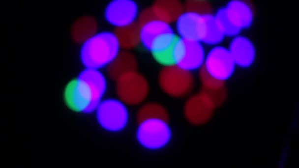 Bokeh Forma Círculos Parpadeando Diferentes Colores — Vídeos de Stock